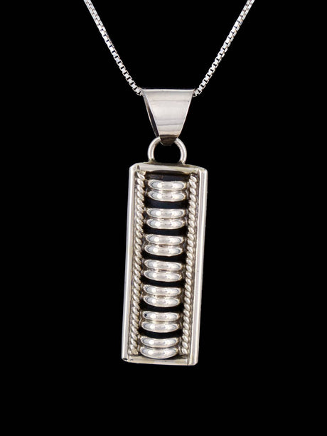 Navajo Sculpted Sterling Silver Pendant - PuebloDirect.com