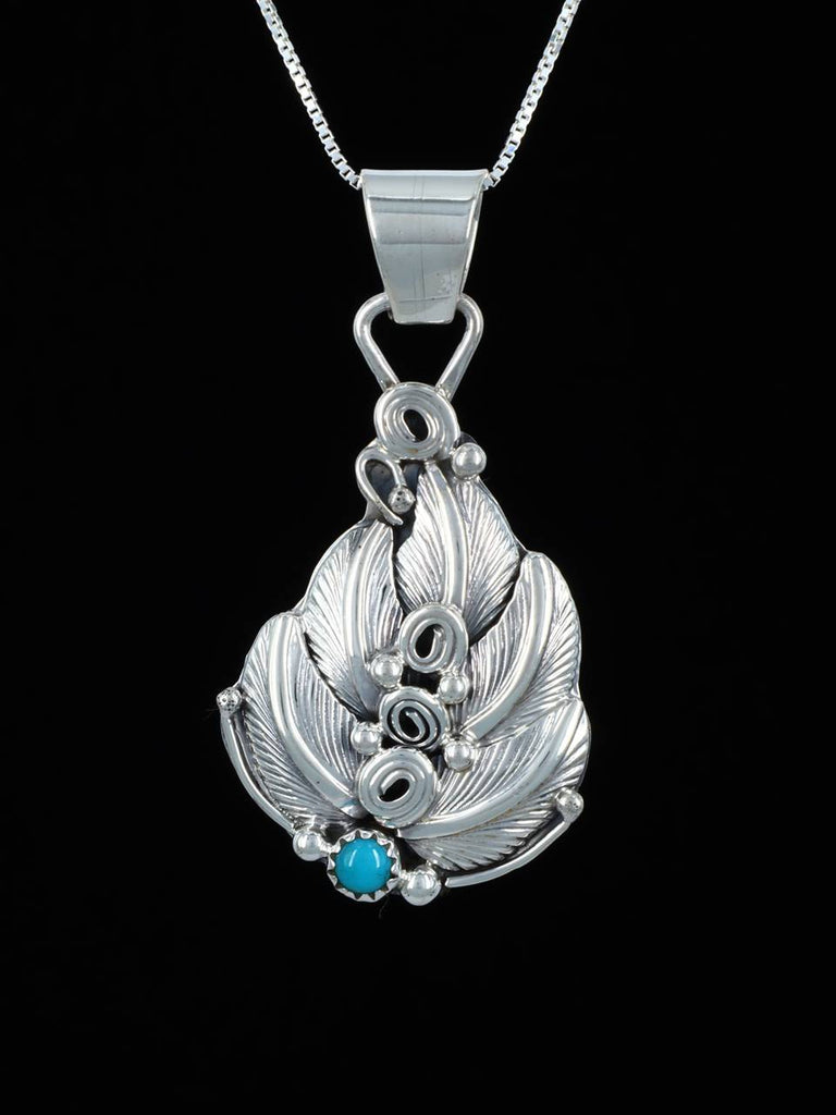 Navajo Sterling Silver Sculpted Turquoise Pendant - PuebloDirect.com