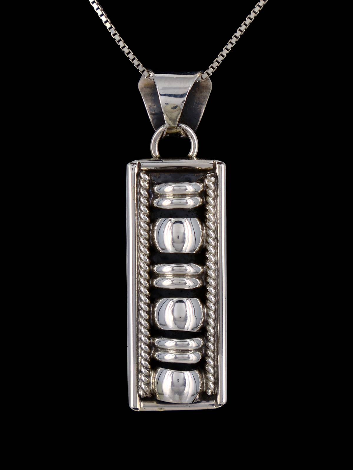 Navajo Sculpted Sterling Silver Pendant