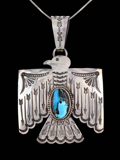 Navajo Sterling Silver Turquoise Thunderbird Pendant - PuebloDirect.com