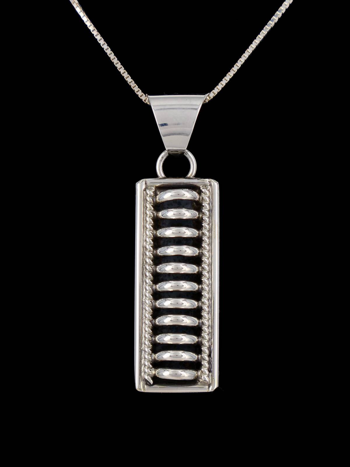 Navajo Sculpted Sterling Silver Pendant
