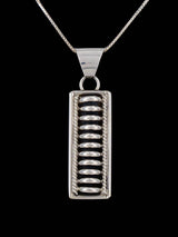 Navajo Sculpted Sterling Silver Pendant