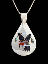 Pendentif oiseau incrusté de bijoux amérindiens