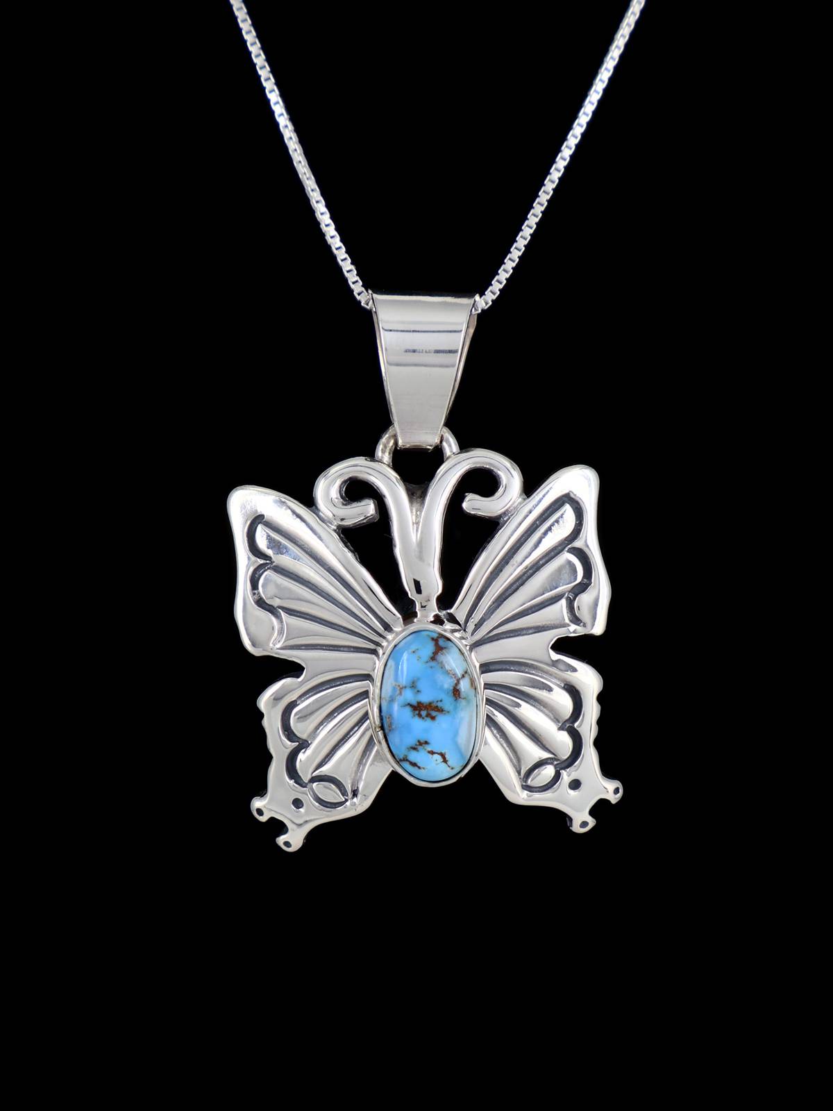 Colgante de mariposa turquesa Golden Hill de plata de ley navajo