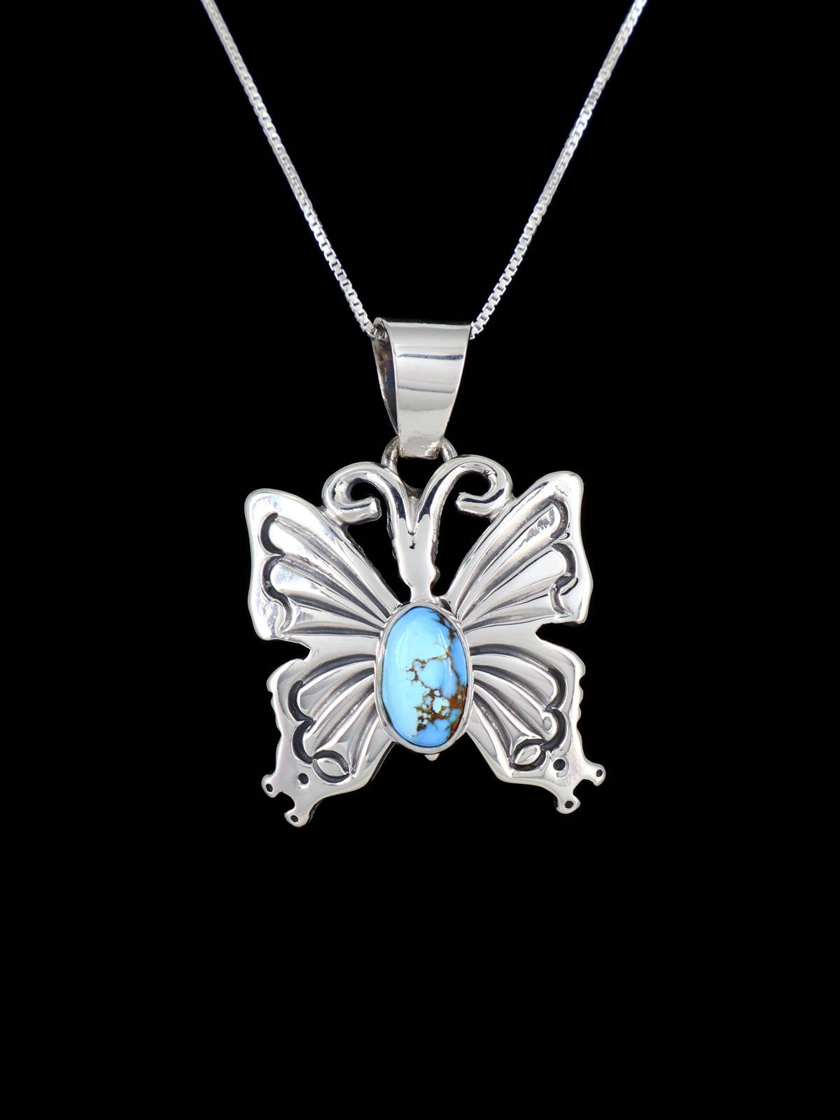 Colgante de mariposa turquesa Golden Hill de plata de ley navajo