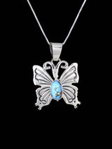 Colgante de mariposa turquesa Golden Hill de plata de ley navajo