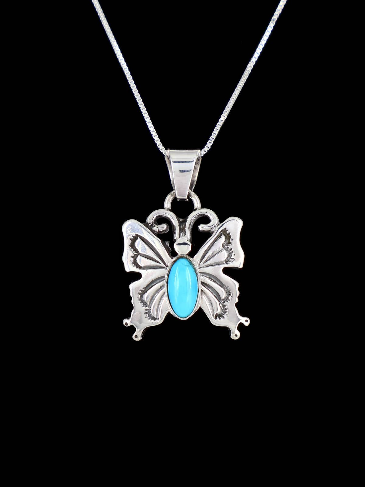 Colgante de mariposa turquesa de la bella durmiente de plata de ley navajo