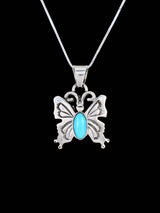 Colgante de mariposa turquesa de la bella durmiente de plata de ley navajo