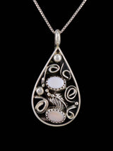 Navajo Jewelry Sterling Silver Pink Shell Sculpted Pendant