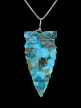 Colgante de punta de flecha turquesa de plata de ley navajo