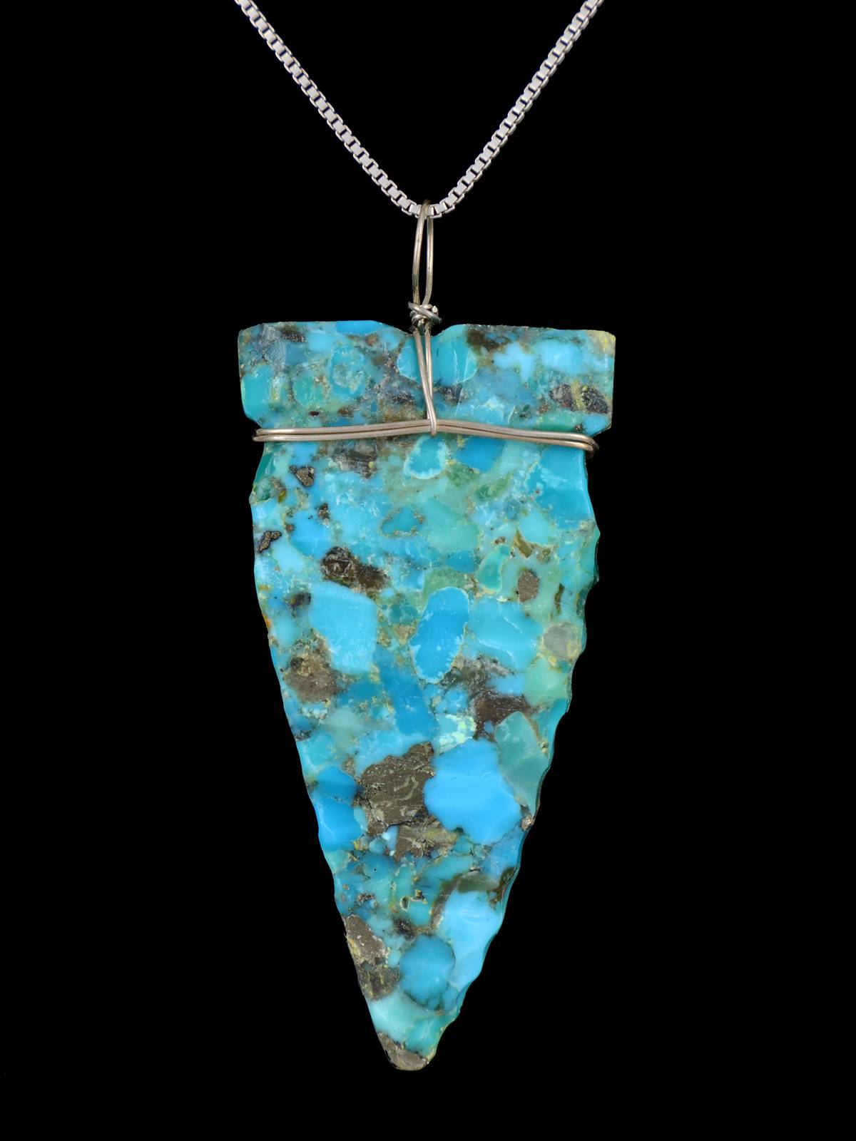 Colgante de punta de flecha turquesa de plata de ley navajo