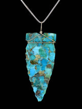 Colgante de punta de flecha turquesa de plata de ley navajo