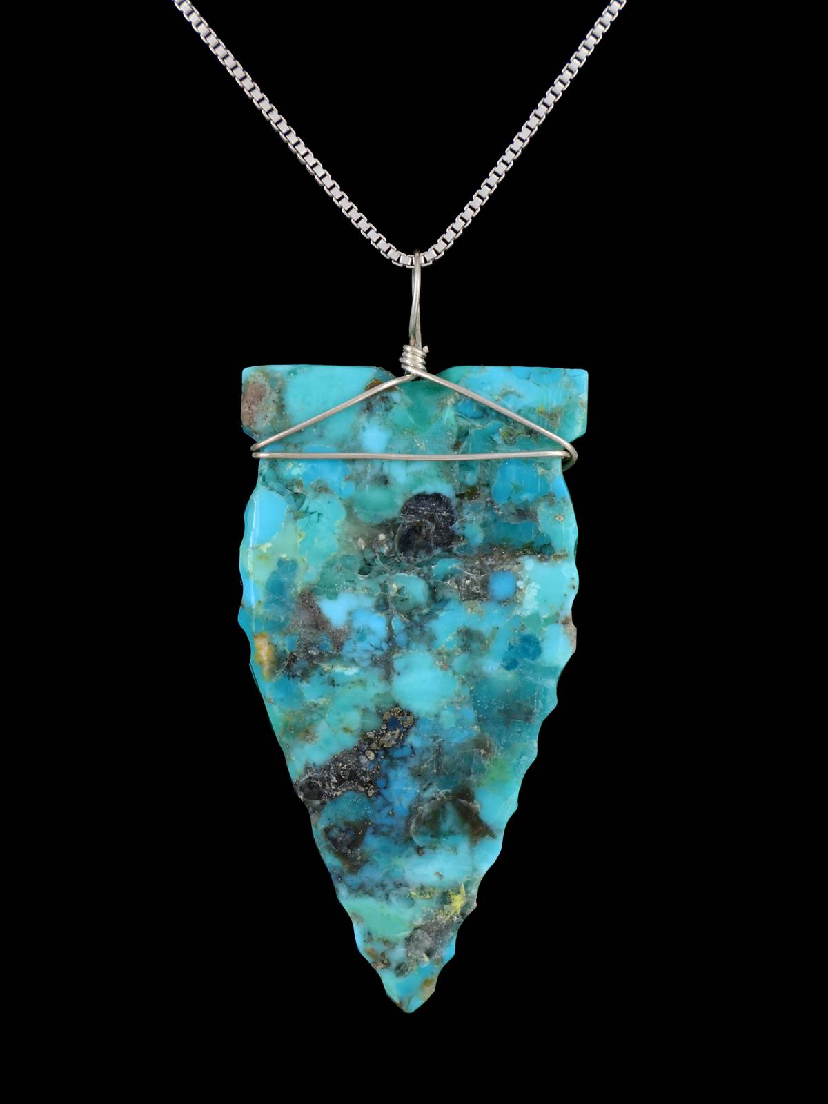 Colgante de punta de flecha turquesa de plata de ley navajo