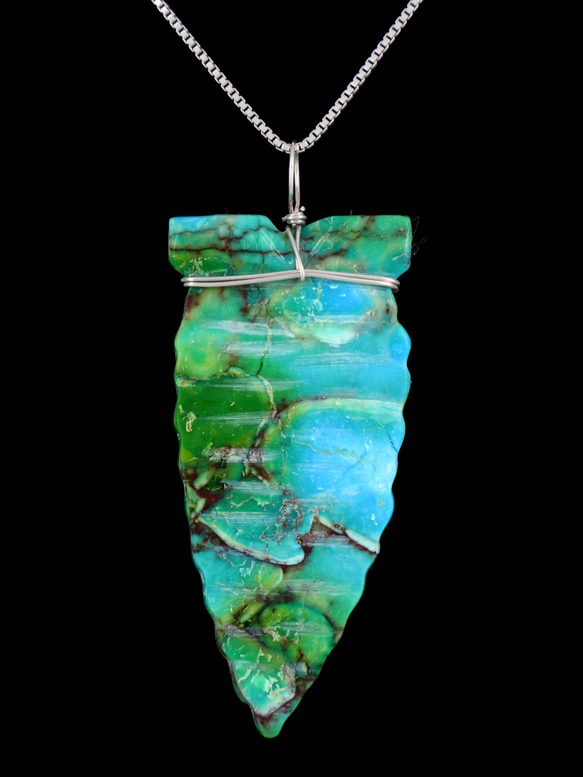 Colgante de punta de flecha turquesa de plata de ley navajo