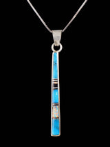 Pendentif amérindien incrusté de turquoise et d’opalite