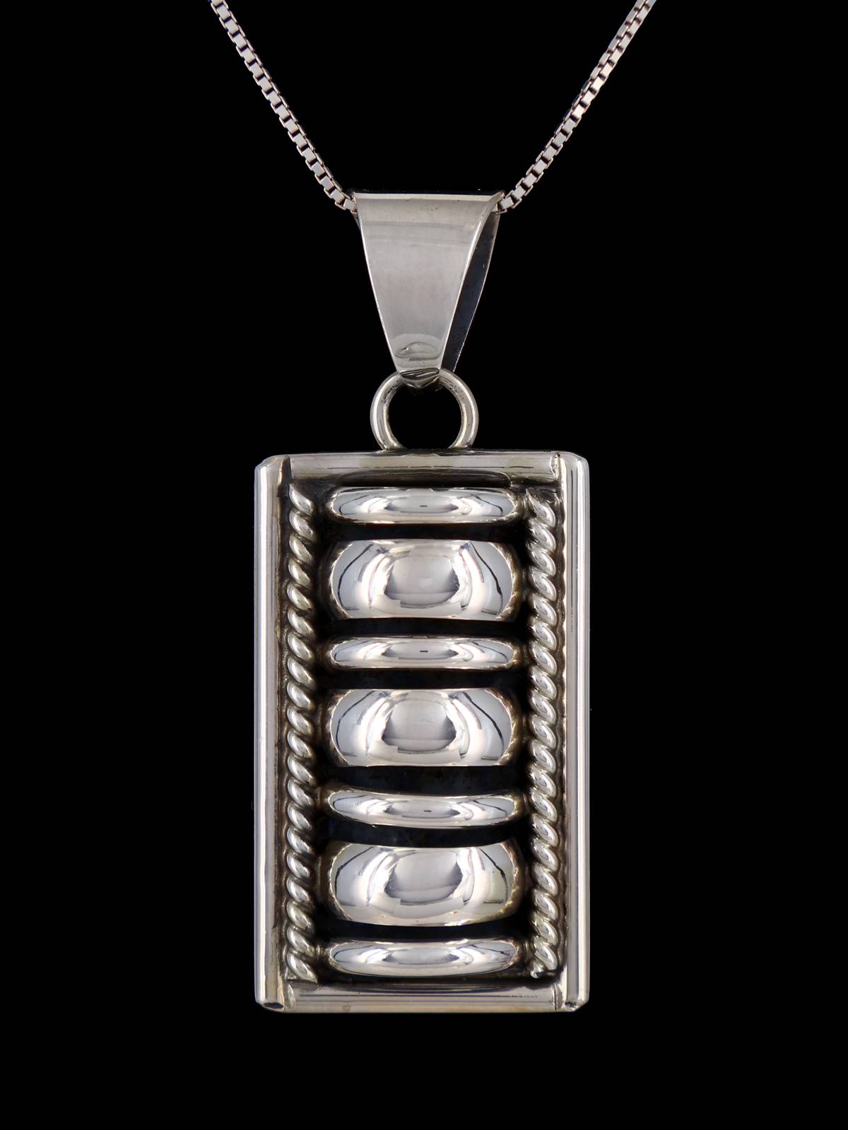 Épingle/pendentif en argent sterling sculpté Navajo