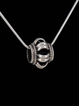 Épingle/pendentif en argent sterling sculpté Navajo