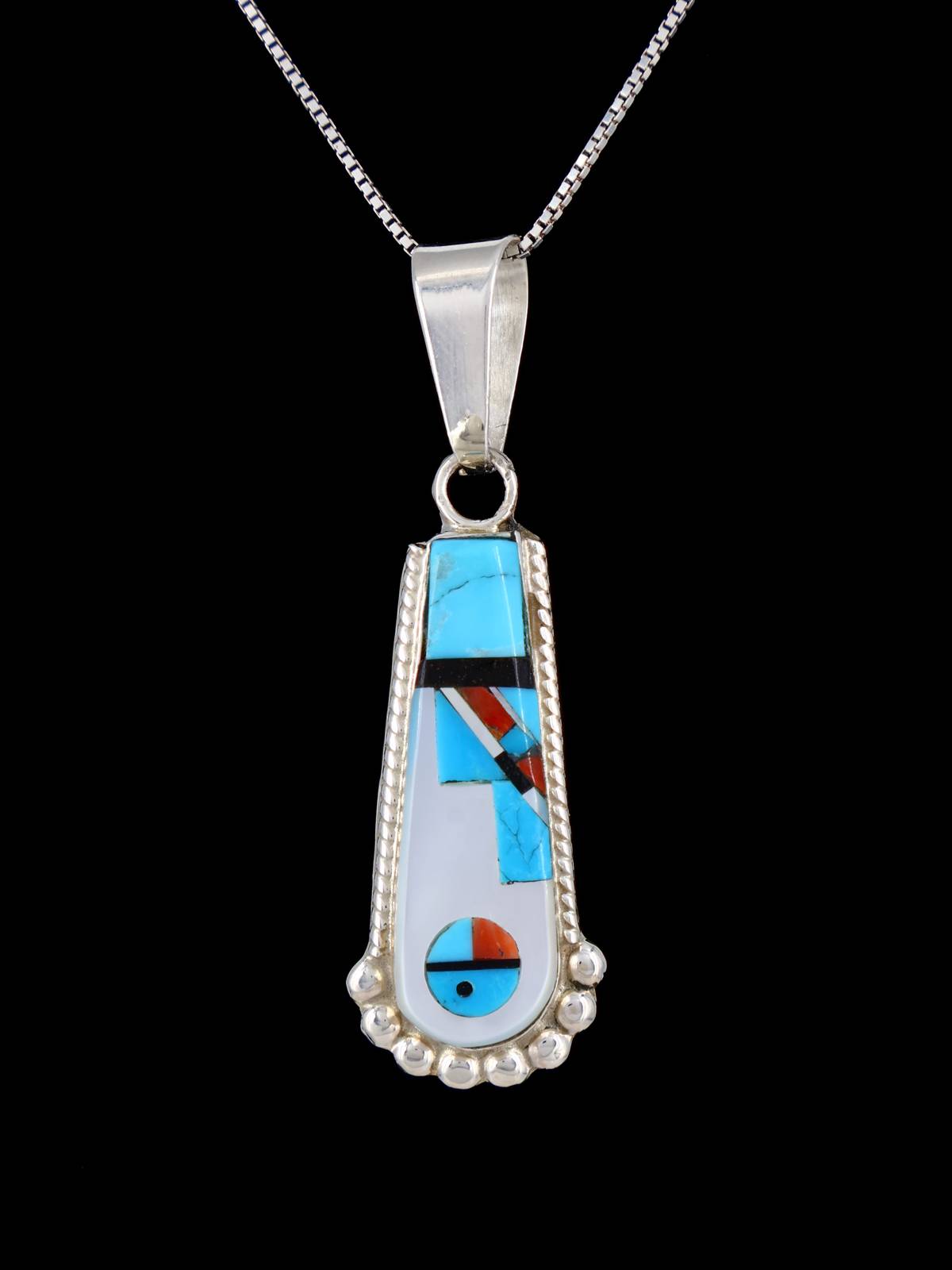 Colgante de plata de ley con incrustaciones de cara de sol Zuni de joyería nativa americana