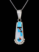Colgante de plata de ley con incrustaciones de cara de sol Zuni de joyería nativa americana