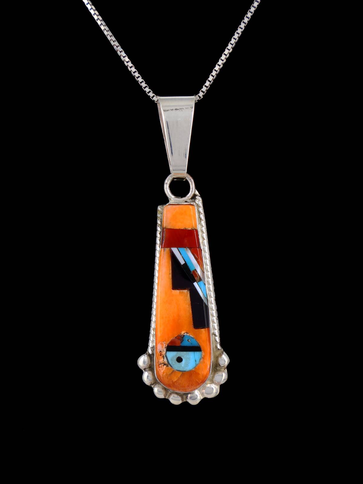 Colgante de plata de ley con incrustaciones de cara de sol Zuni de joyería nativa americana