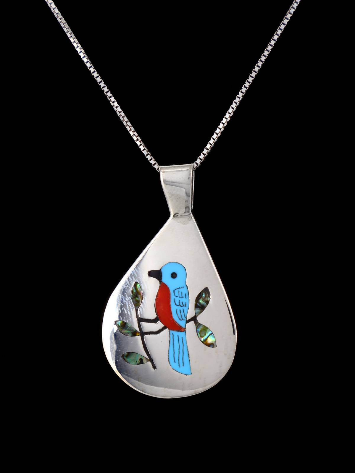 Pendentif oiseau incrusté de bijoux amérindiens