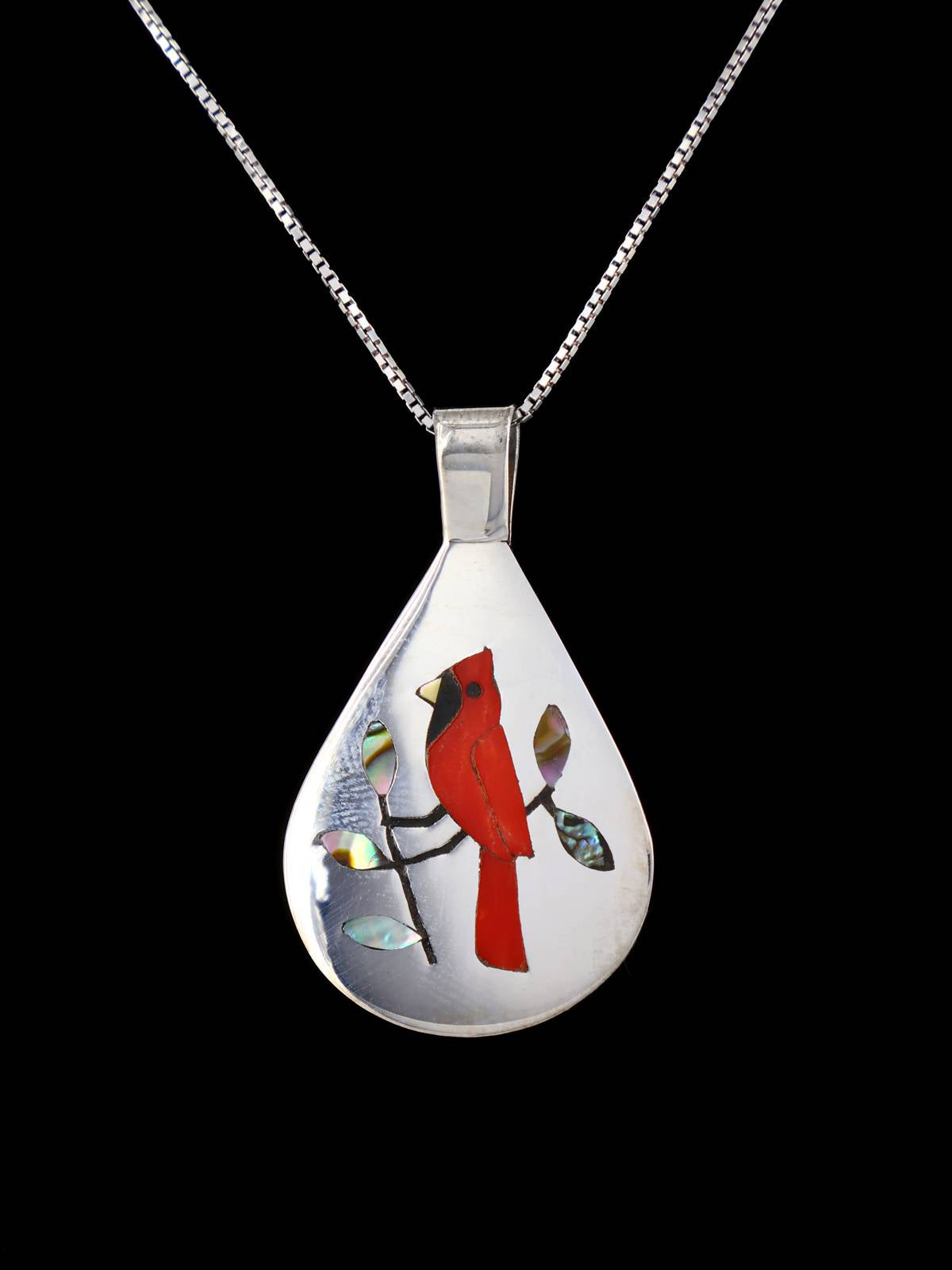 Pendentif oiseau incrusté de bijoux amérindiens