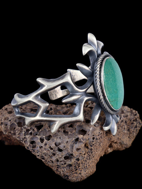 Pulsera de puño de hueso de dinosaurio con gema de plata de ley fundida de Tufa Navajo