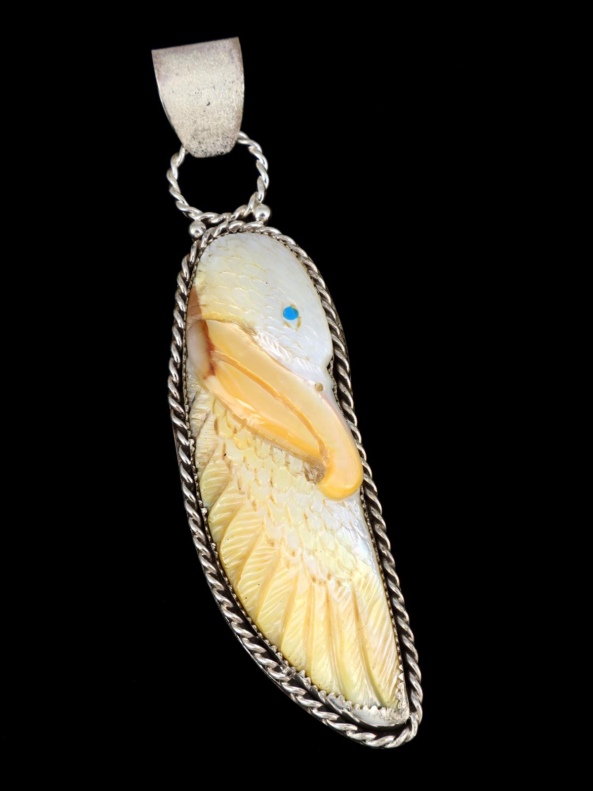 Zuni Sterling Silver Carved Mother of Pearl Eagle Pendant - PuebloDirect.com