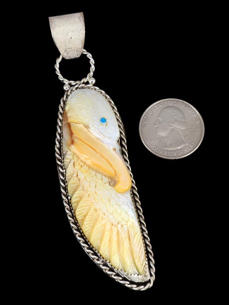 Zuni Sterling Silver Carved Mother of Pearl Eagle Pendant - PuebloDirect.com