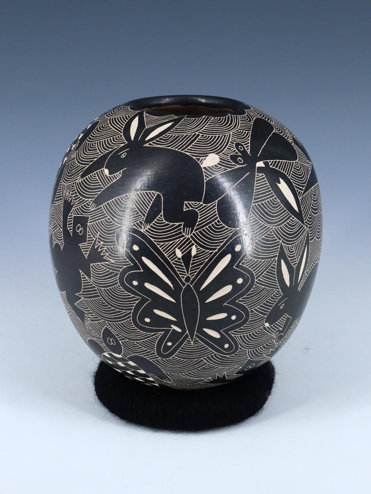 Cerámica de vida silvestre negra Mata Ortiz enrollada a mano