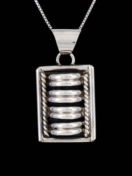 Navajo Sculpted Sterling Silver Pendant - PuebloDirect.com