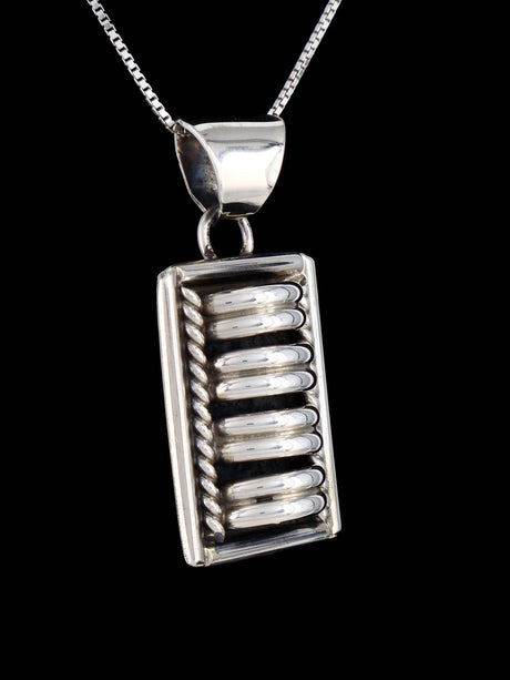 Navajo Sculpted Sterling Silver Pendant - PuebloDirect.com
