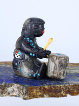 Serpentine baterista Zuni Fetiche