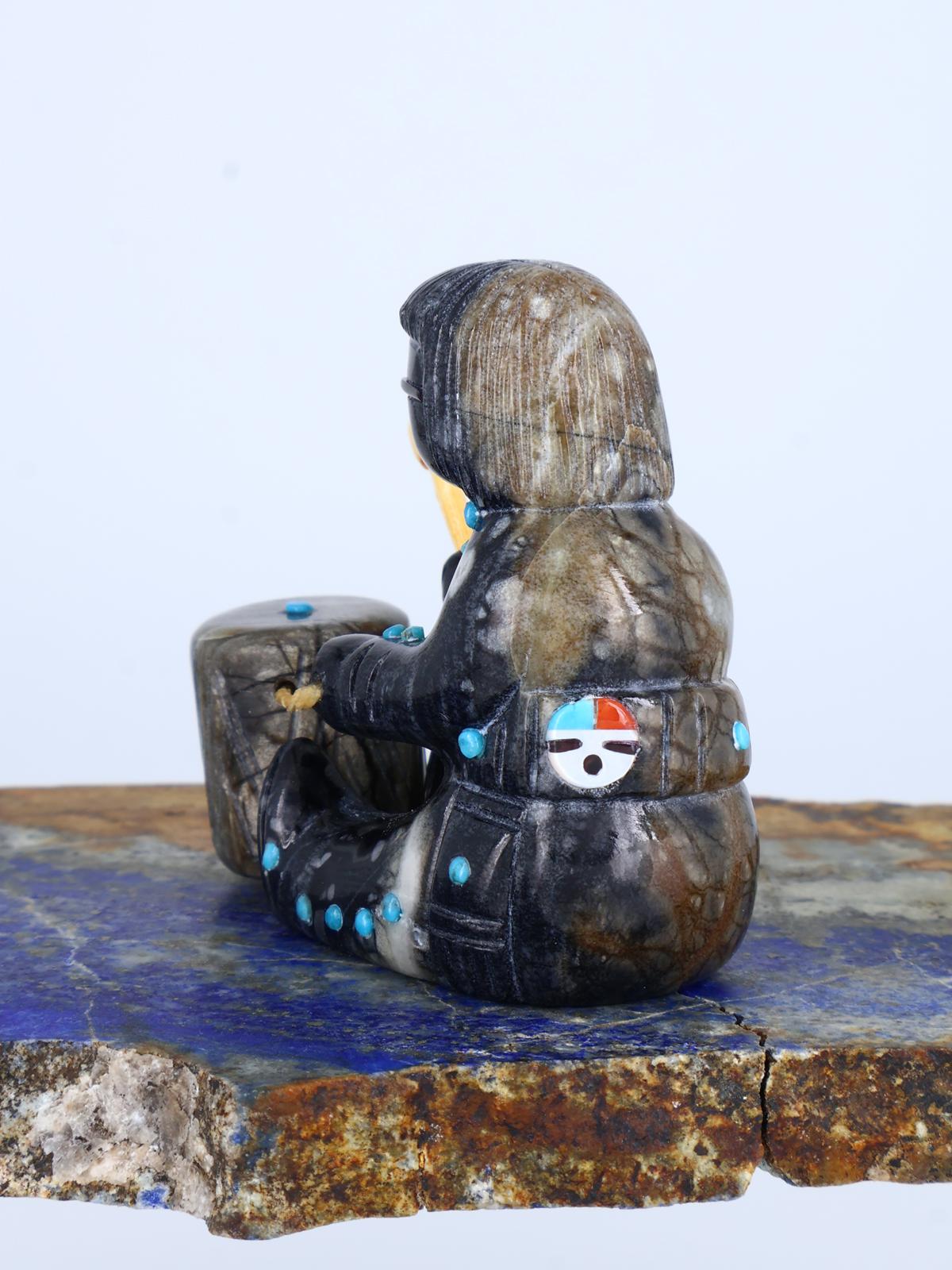 Serpentine baterista Zuni Fetiche