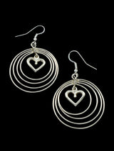 Navajo Sterling Silver Sculpted Heart Dangle Earrings - PuebloDirect.com