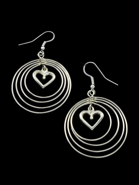 Navajo Sterling Silver Sculpted Heart Dangle Earrings - PuebloDirect.com